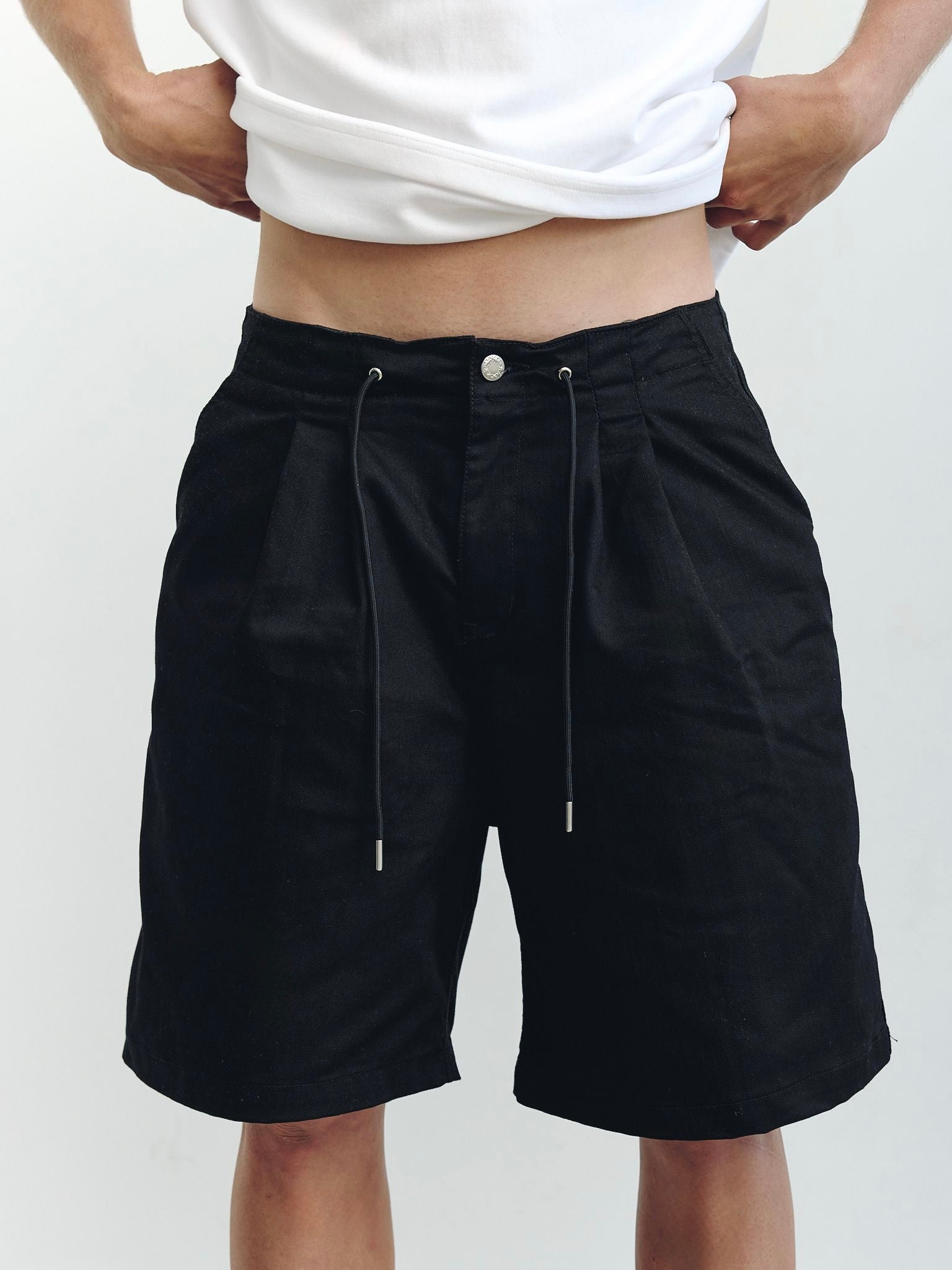 Pleated black shorts